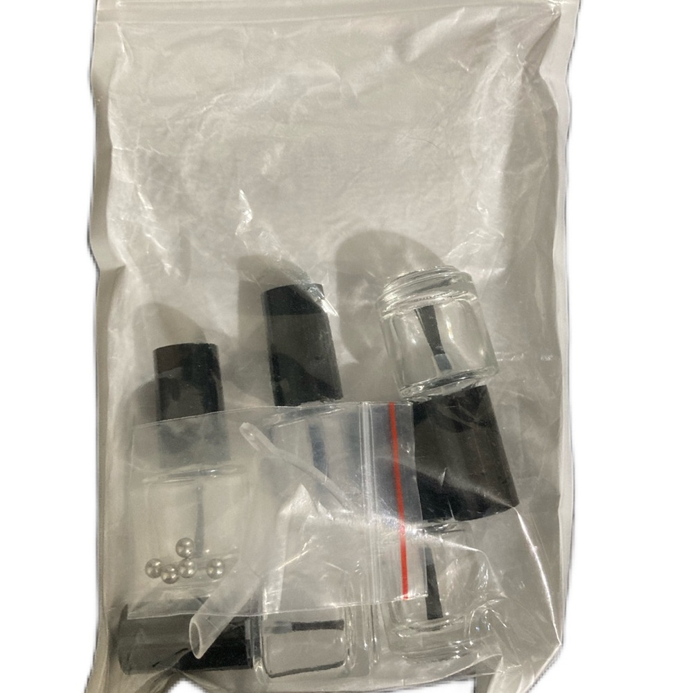 Lot of six empty nail polish bottles